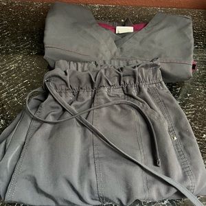 2 pair Scrubstar scrubs 1 2xl, 1 xl top & 2xl bottoms.